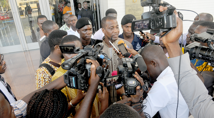 Mr Jacob Osei Yeboah (behind microphones), Independent Candidate, speaking to journalists after the hearing at the High Court, Accra. Picture: EMMANUEL ASAMOAH ADDAI 